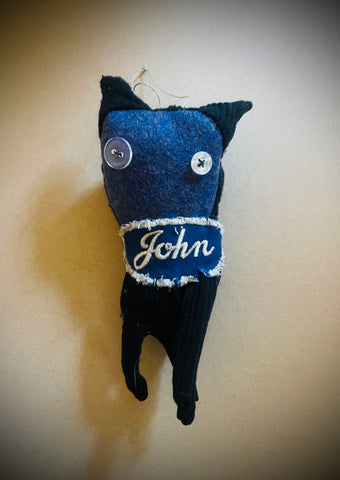 Orphaned sock ornament: John