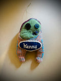 Orphaned sock ornament: Kenny